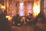 [PICTURE - Jon Jon and Reggie in living room]